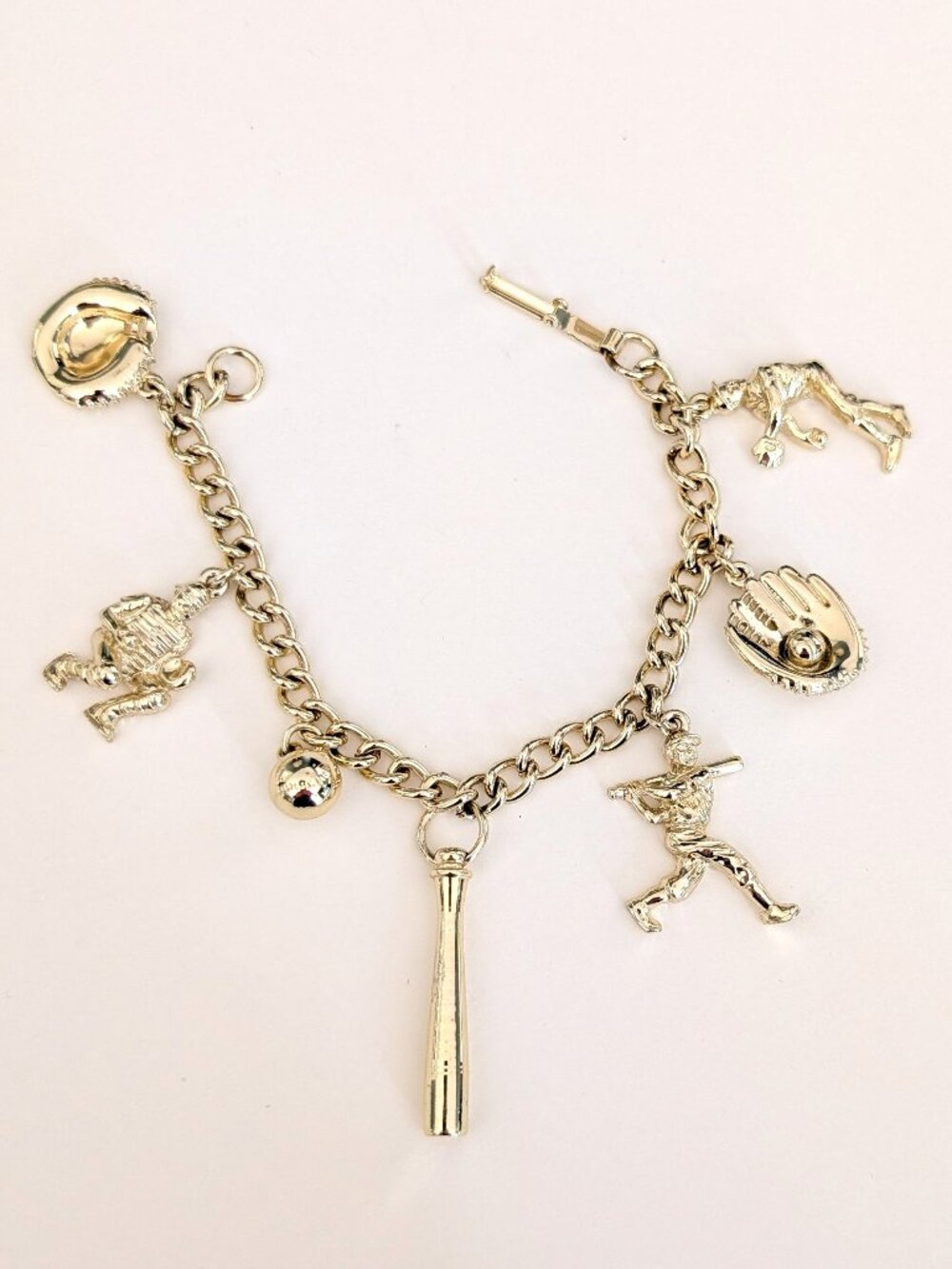Gold tone baseball charm bracelet